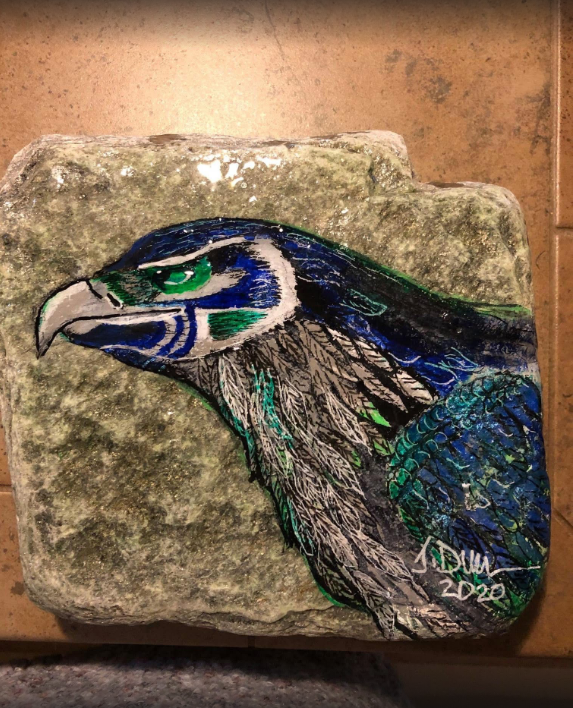 A detailed painting of a colorful bird on a rock.